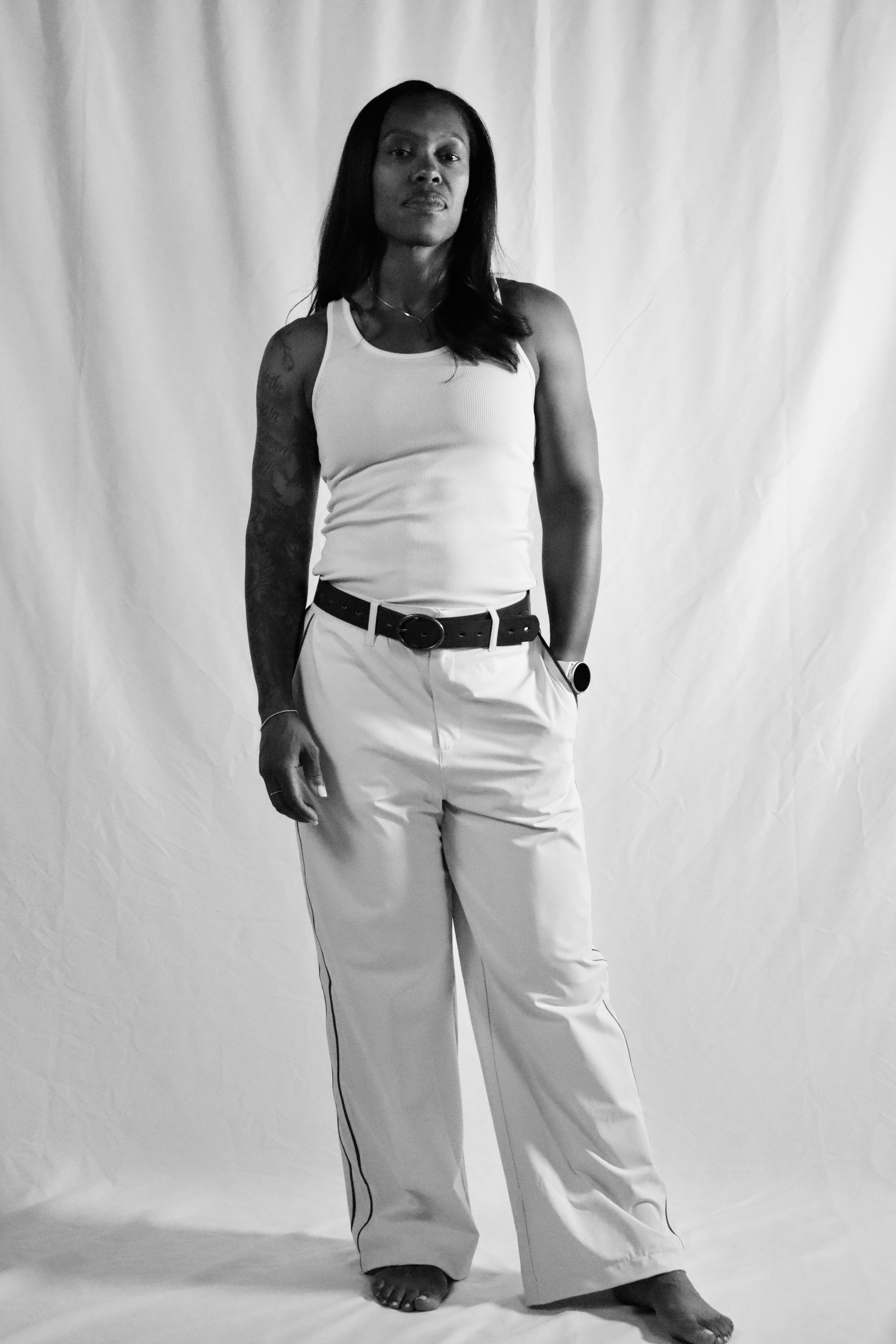 Brittanie Fleming, life and health coach, in a black and white portrait